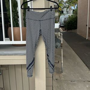 Tory Burch sport leggings in navy and white.